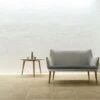 CH72 Sofa Frame Soaped Oak Upholstered In Melange 120 1 CH72 Sofa Frame Soaped Oak Upholstered In Melange 120 -Vitra || Muuto Sales ch72 sofa lifestyle 2 2